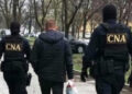 Șeful unei şcoli auto din capitală şi doi subalterni, reținuți